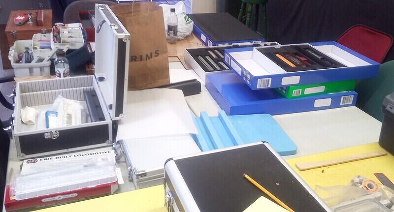 Table space full of train boxes