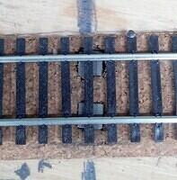 Magnetic uncoupler under new track